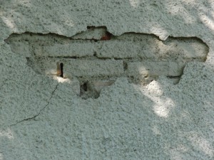 Ziegelsteinmauer mit kaputten Verputz Ziegelsteinmauer mit kaputten Verputz